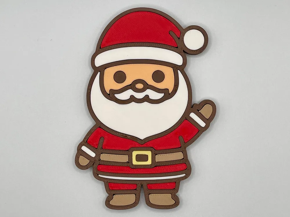 Santa fridge magnet with red suit, white beard, and waving hand