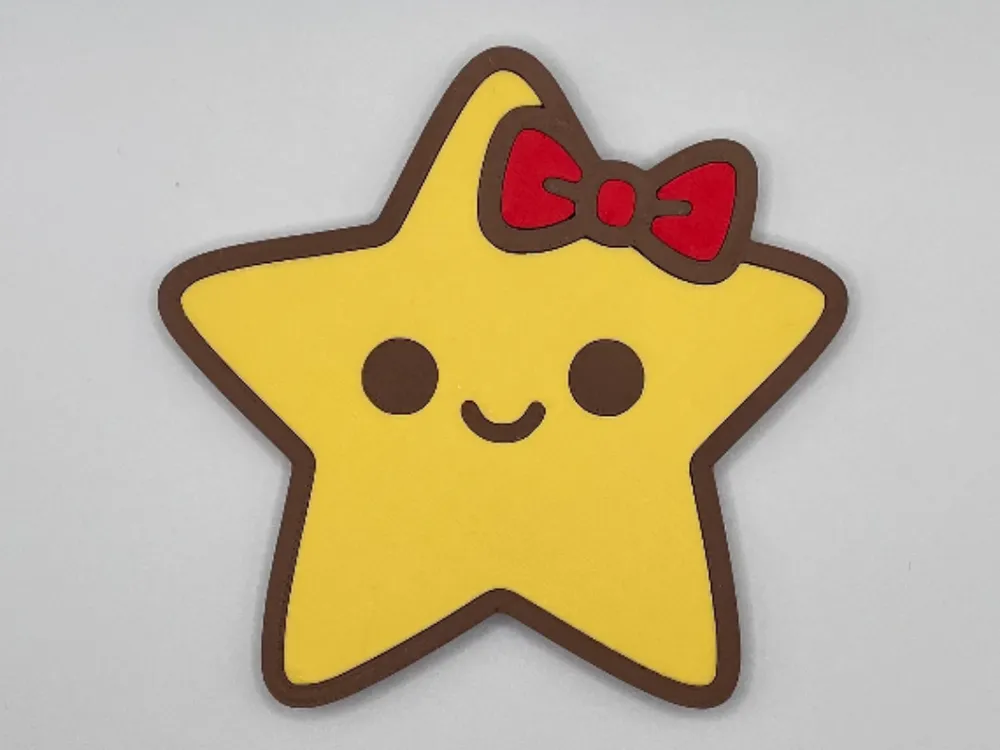 Star fridge magnet with a red bow
