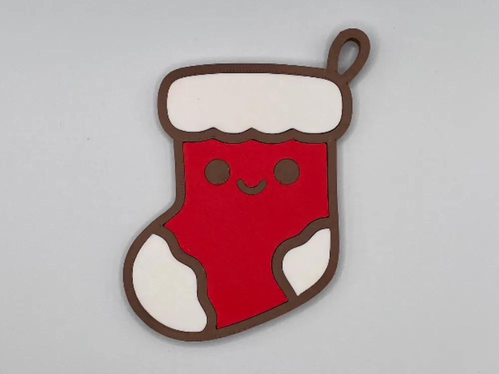 Stocking fridge magnet with white cuff and red body