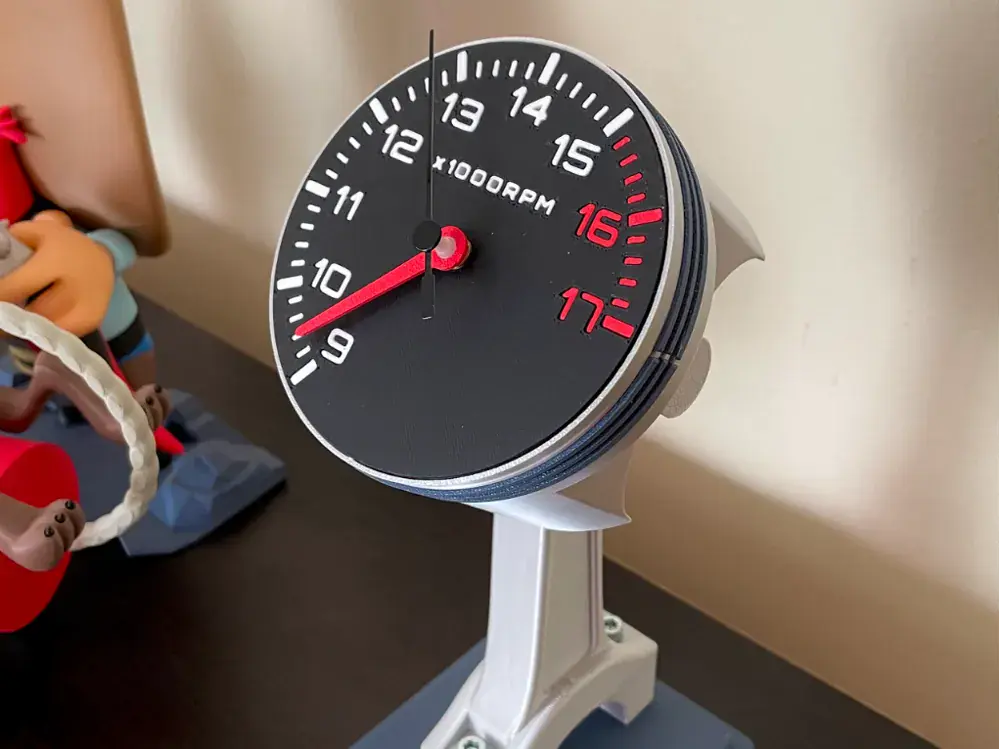 9-to-5 tachometer piston clock