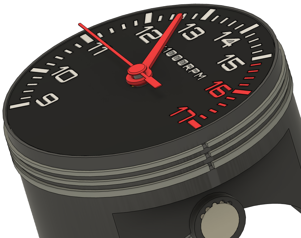 Piston clock angled view: piston head with ring grooves, black RPM dial, red hands, connecting rod